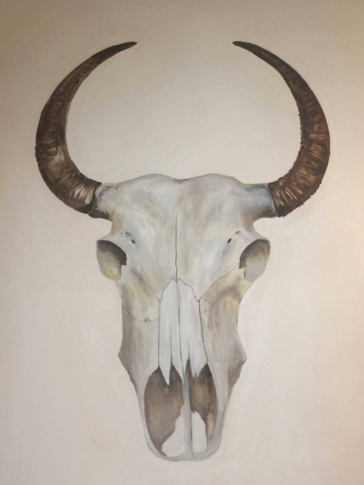 Painting of a bleached bull skull with curved horns on a cream ground